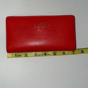 EUC Kate Spade wallet burnt orange in color